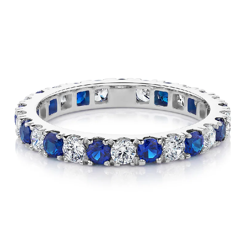 Women’s romantic promise rings-All-rounder eternity band with sapphire simulants and 0.78 carats* of diamond simulants in 14 carat white gold