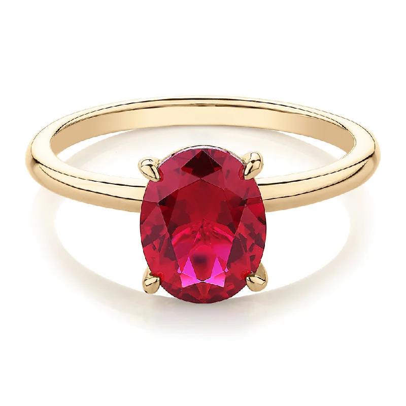 Women’s vintage rings-Dress ring with ruby simulant in 10 carat yellow gold