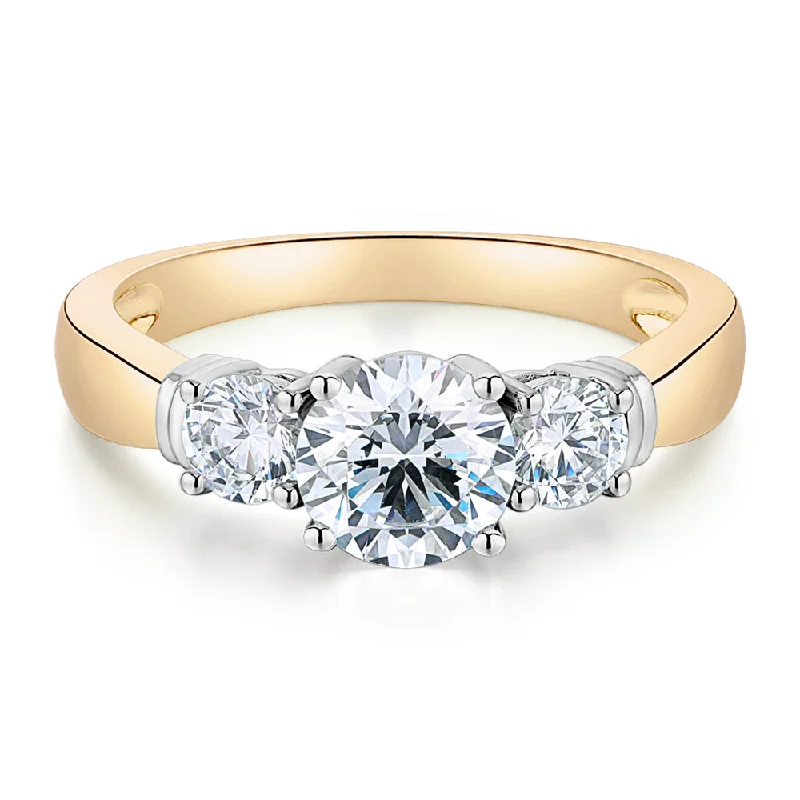 Women’s diamond rings-Three stone ring with 1.53 carats* of diamond simulants in 14 carat yellow and white gold