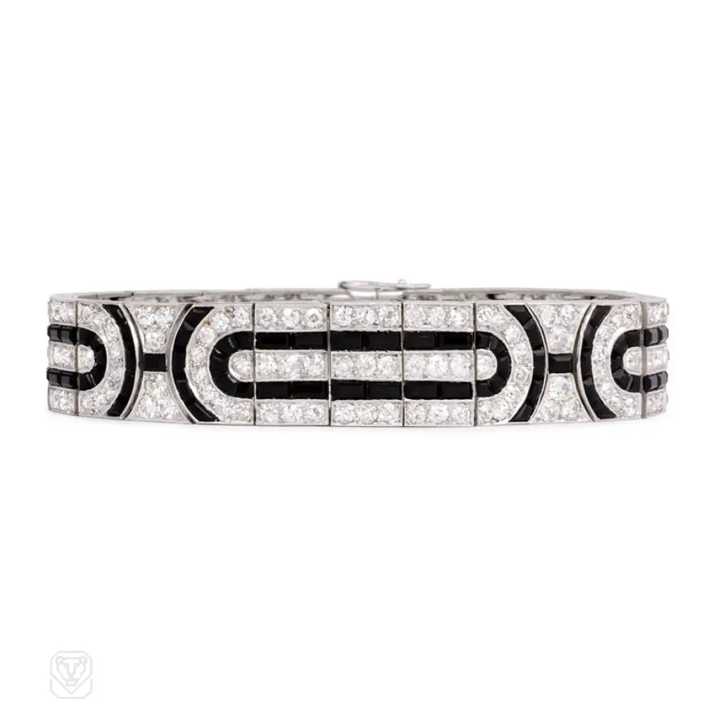 Women’s infinity bangle-Art Deco diamond and calibré onyx bracelet, France