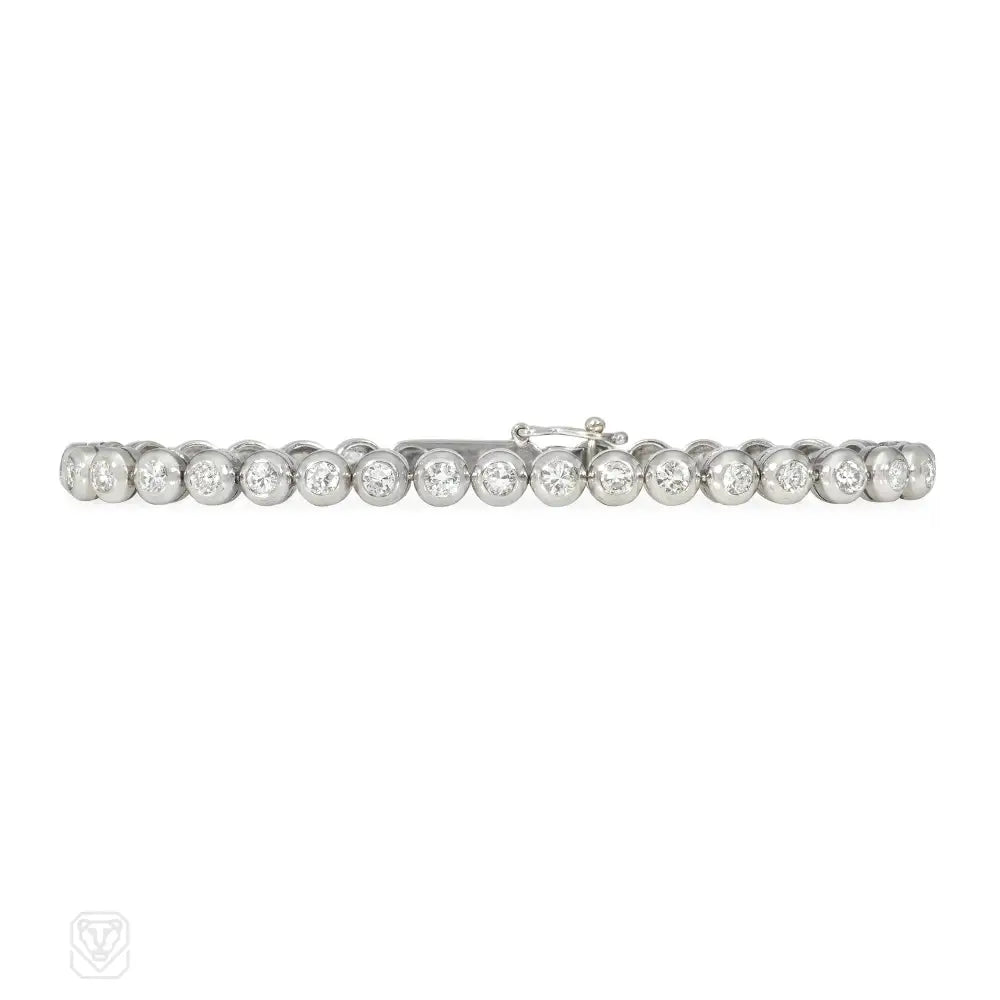 Women’s casual bracelet-1950s collet set diamond and platinum line bracelet