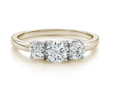 Women’s round-cut engagement rings-Three stone ring with 1 carats* of diamond simulants in 10 carat yellow and white gold