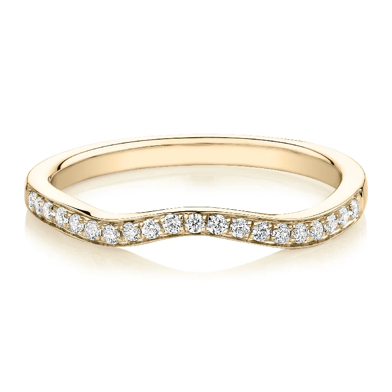 Women’s stackable rings-Round Brilliant curved wedding or eternity band in 14 carat yellow gold