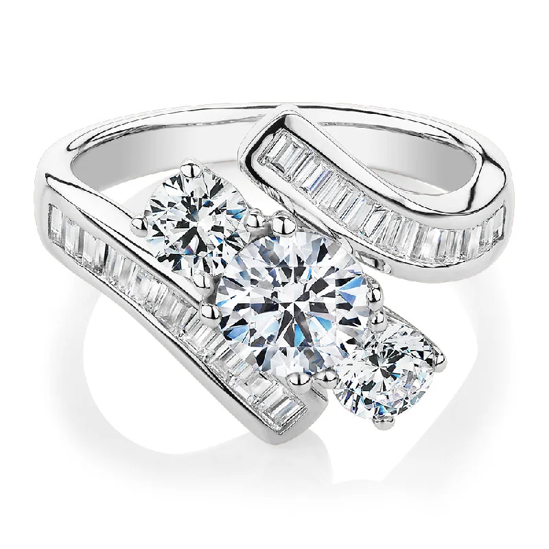 Women’s diamond rings-Three stone ring with 2.63 carats* of diamond simulants in 10 carat white gold