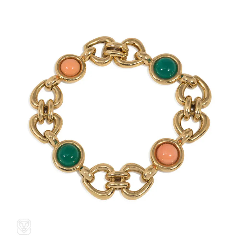 Women’s thin bangle-Van Cleef and Arpels gold, coral, and chrysoprase bracelet. France.