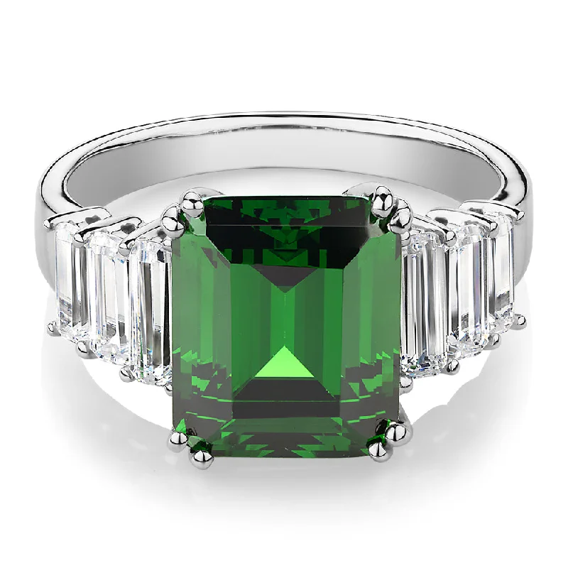 Women’s large rings-Dress ring with emerald simulant and 1.44 carats* of diamond simulants in 10 carat white gold