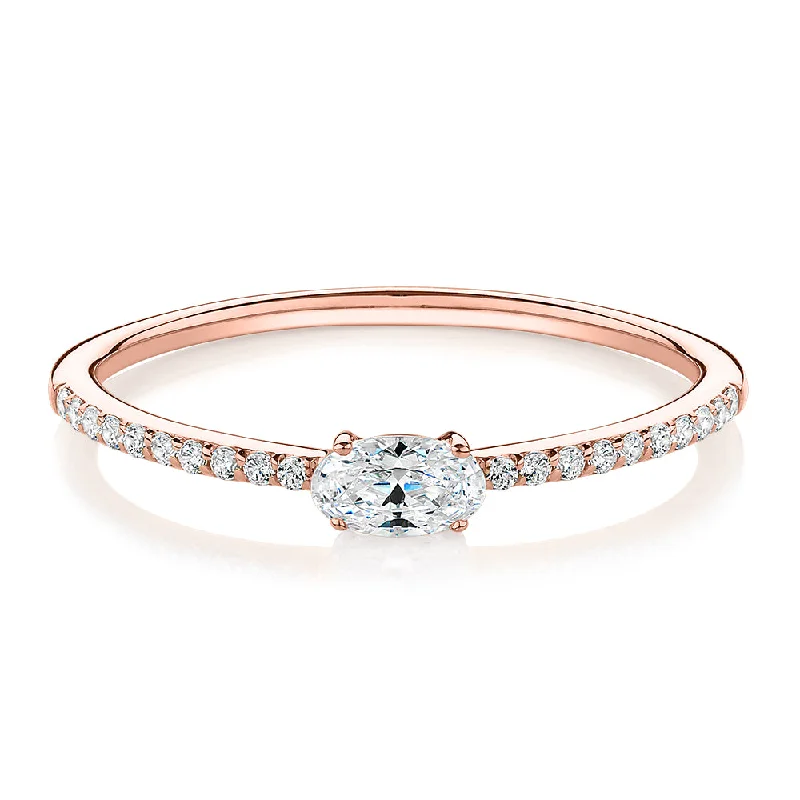 Women’s oval rings-Dress ring with 0.31 carats* of diamond simulants in 10 carat rose gold