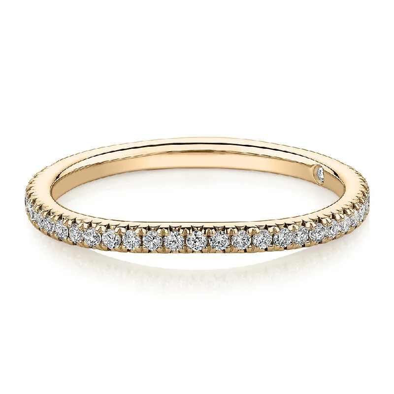 Women’s sapphire rings-Signature Simulant Diamond 0.23 carat* TW round brilliant curved wedding or eternity band in 14 carat yellow gold