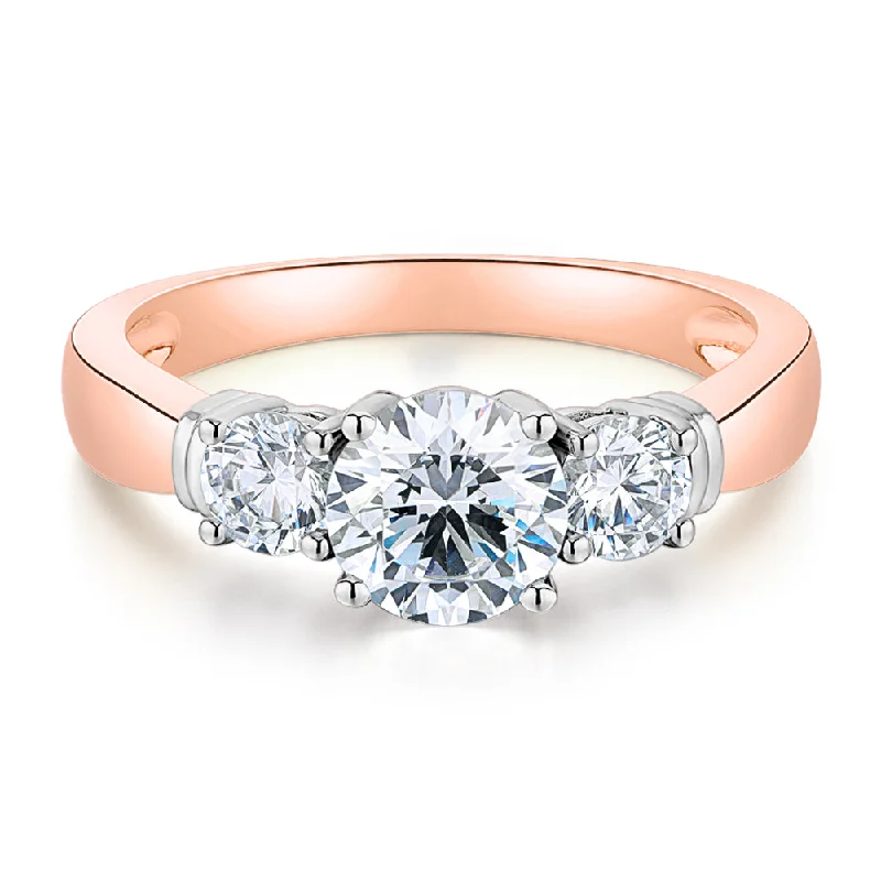 Women’s romantic promise rings-Three stone ring with 1.53 carats* of diamond simulants in 14 carat rose and white gold