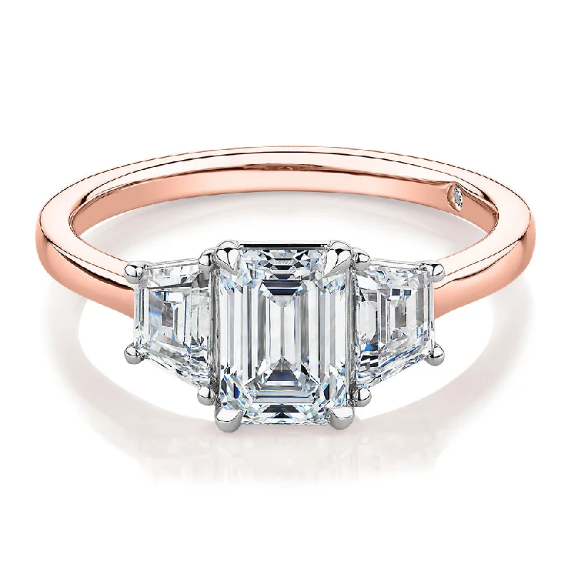 Women’s affordable rings-Signature Simulant Diamond 1.87 carat* TW emerald cut three stone ring in 14 carat rose and white gold