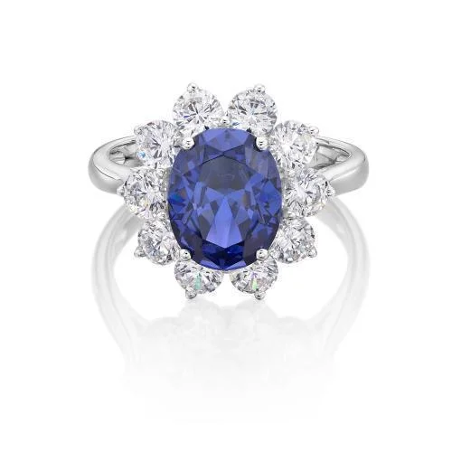 Women’s cocktail diamond rings-Dress ring with 10x8mm tanzanite simulant and 1.7 carats* of diamond simulants in 10 carat white gold