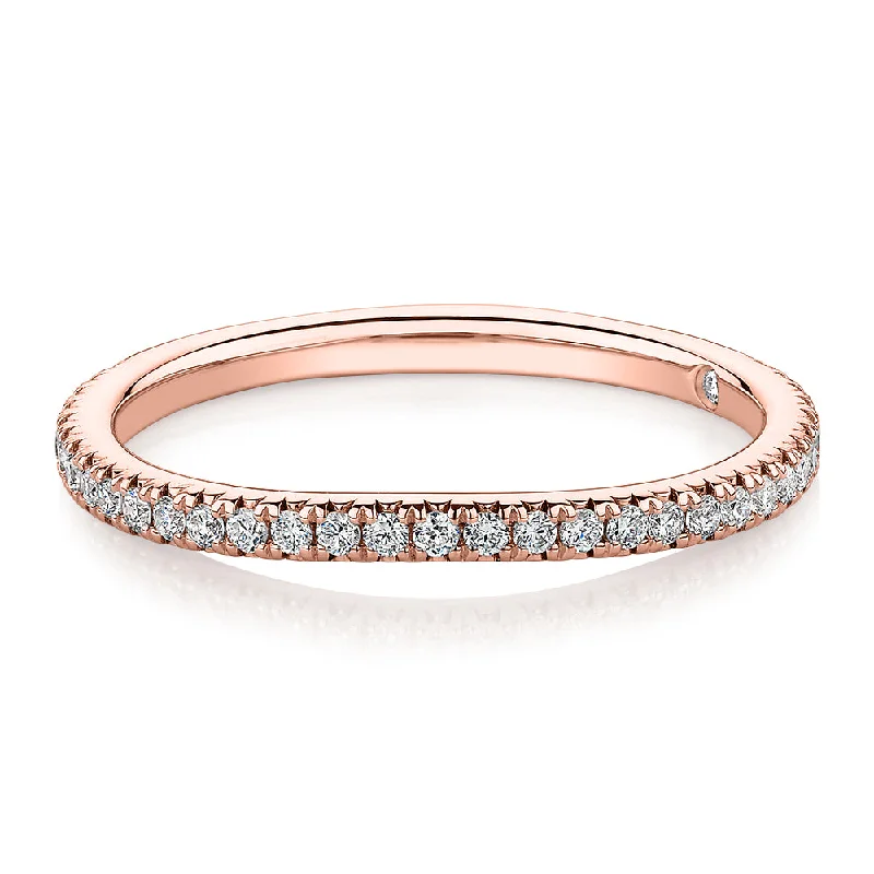 Women’s trendy rings-Signature Simulant Diamond 0.23 carat* TW round brilliant curved wedding or eternity band in 14 carat rose gold