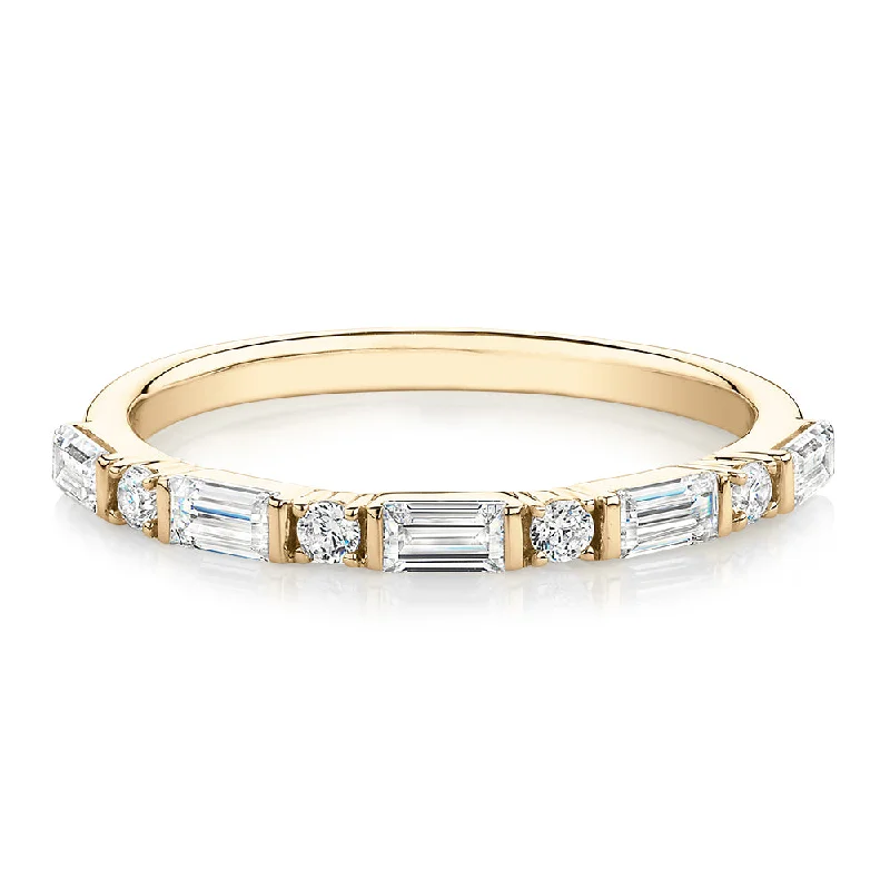 Women’s cocktail rings-Baguette wedding or eternity band with 0.75 carats* of diamond simulants in 10 carat yellow gold