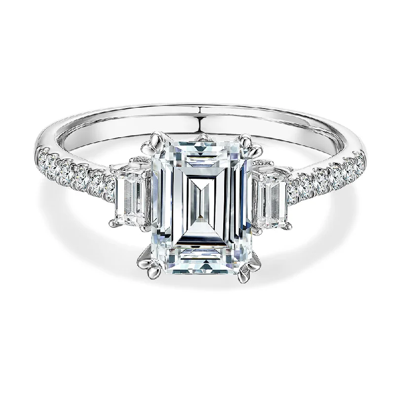 Women’s thick band engagement rings-Three stone ring with 2.2 carats* of diamond simulants in 14 carat white gold